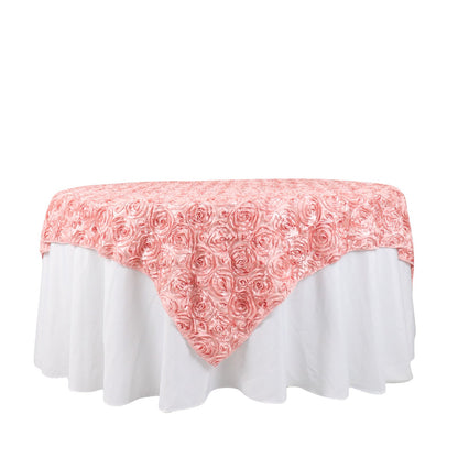 Dusty rose 3D rosette satin table overlay on a round table.