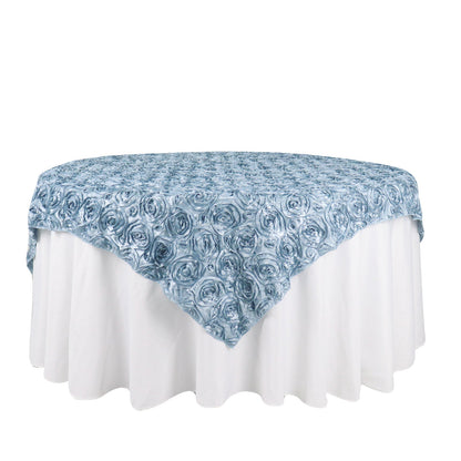 Dusty blue 3D rosette satin table overlay on a round table.