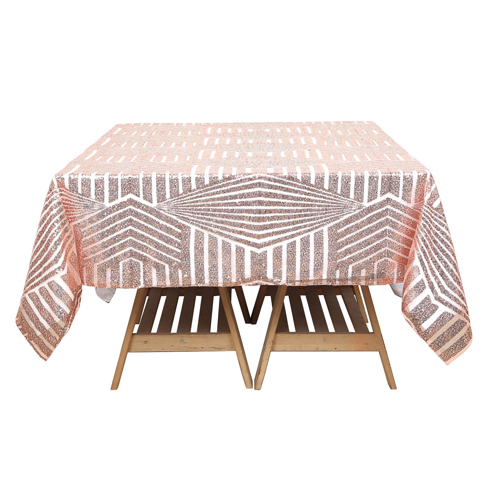 Blush diamond glitz sequin table overlay topper on a wooden table.