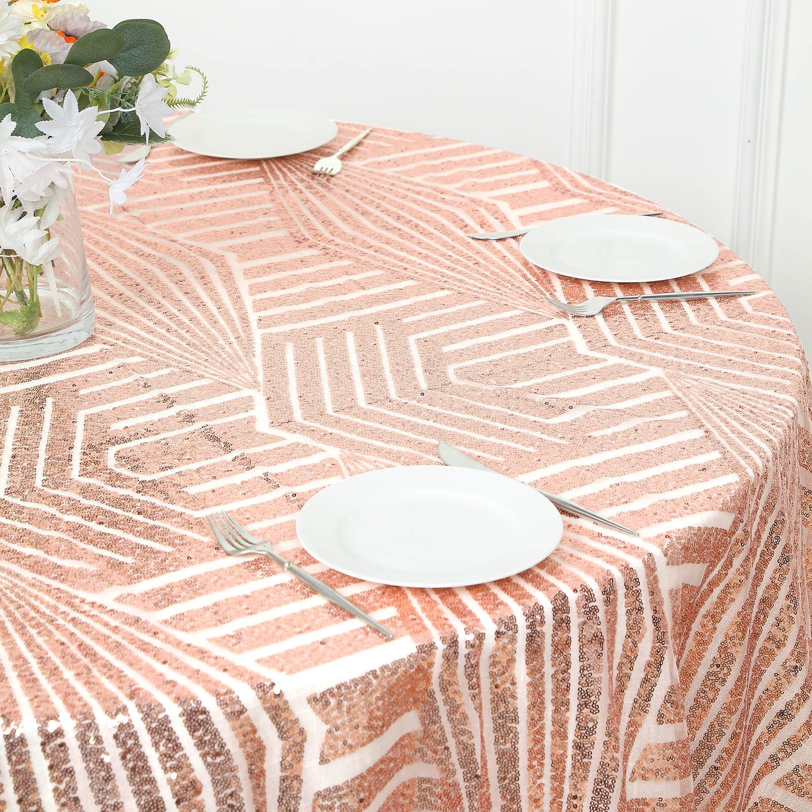 Blush diamond glitz sequin table overlay on a round table.