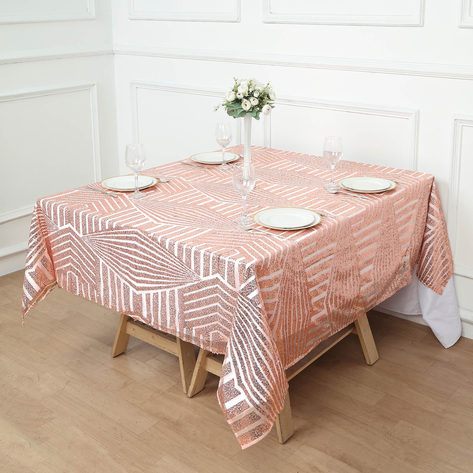 Blush diamond glitz sequin table overlay topper on a square table.