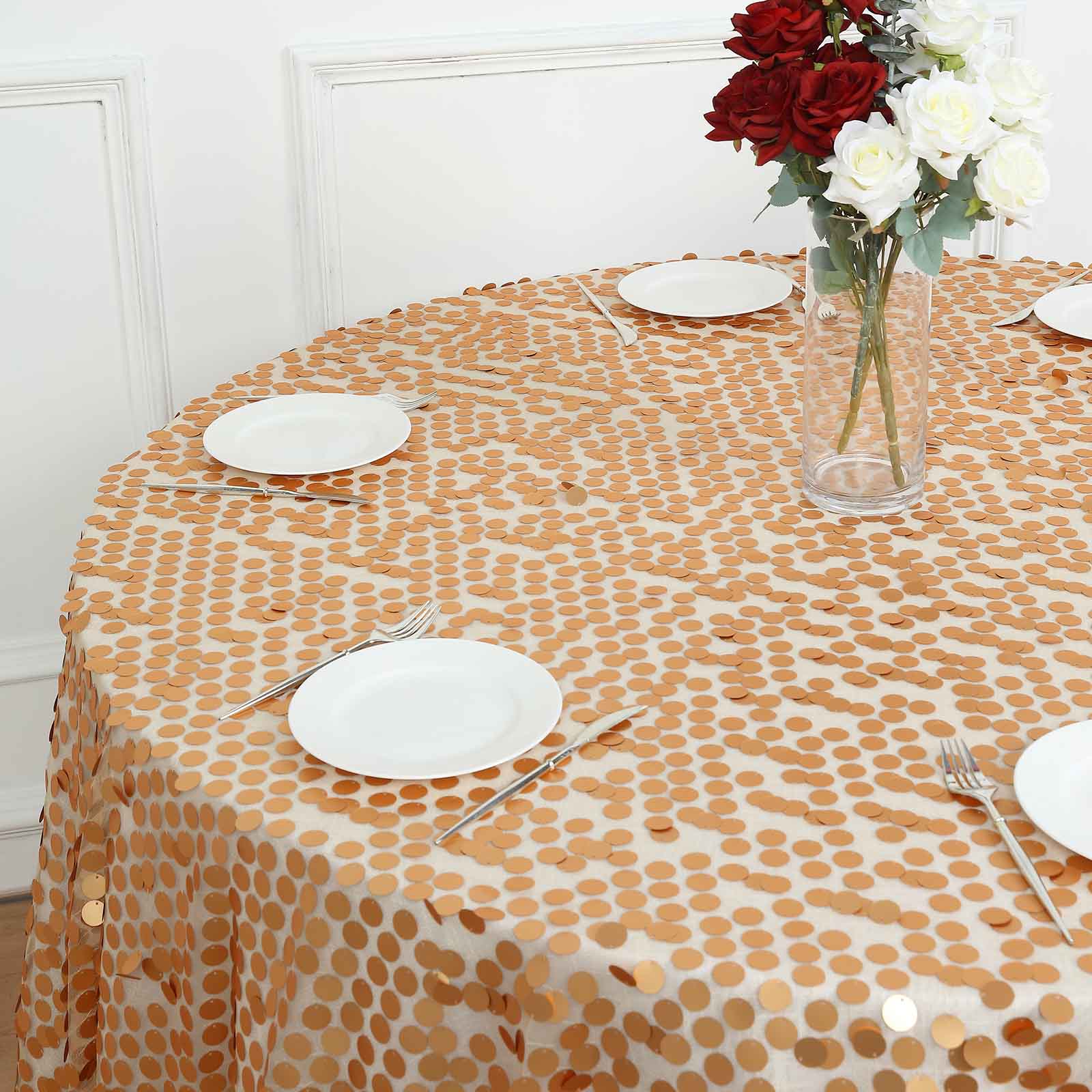 Matte champagne big payette sequin table overlay on a round table.