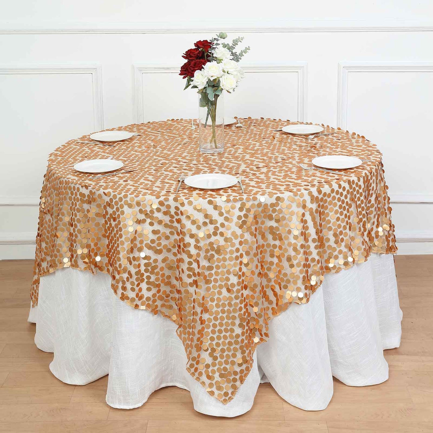 Matte champagne big payette sequin table overlay on round table.