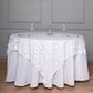 White sequin square table overlay for elegant dining decor.