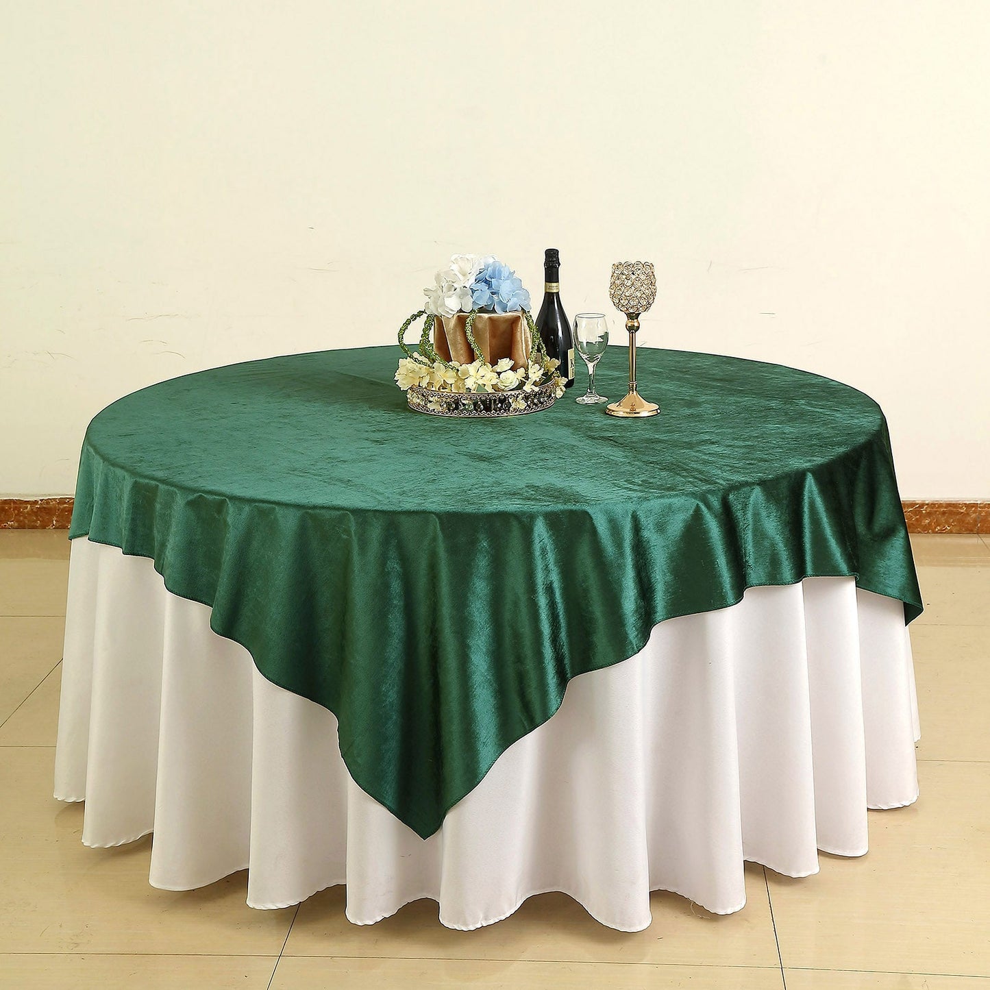 72"x72" Hunter Emerald Green Velvet Table Overlay on a round table.