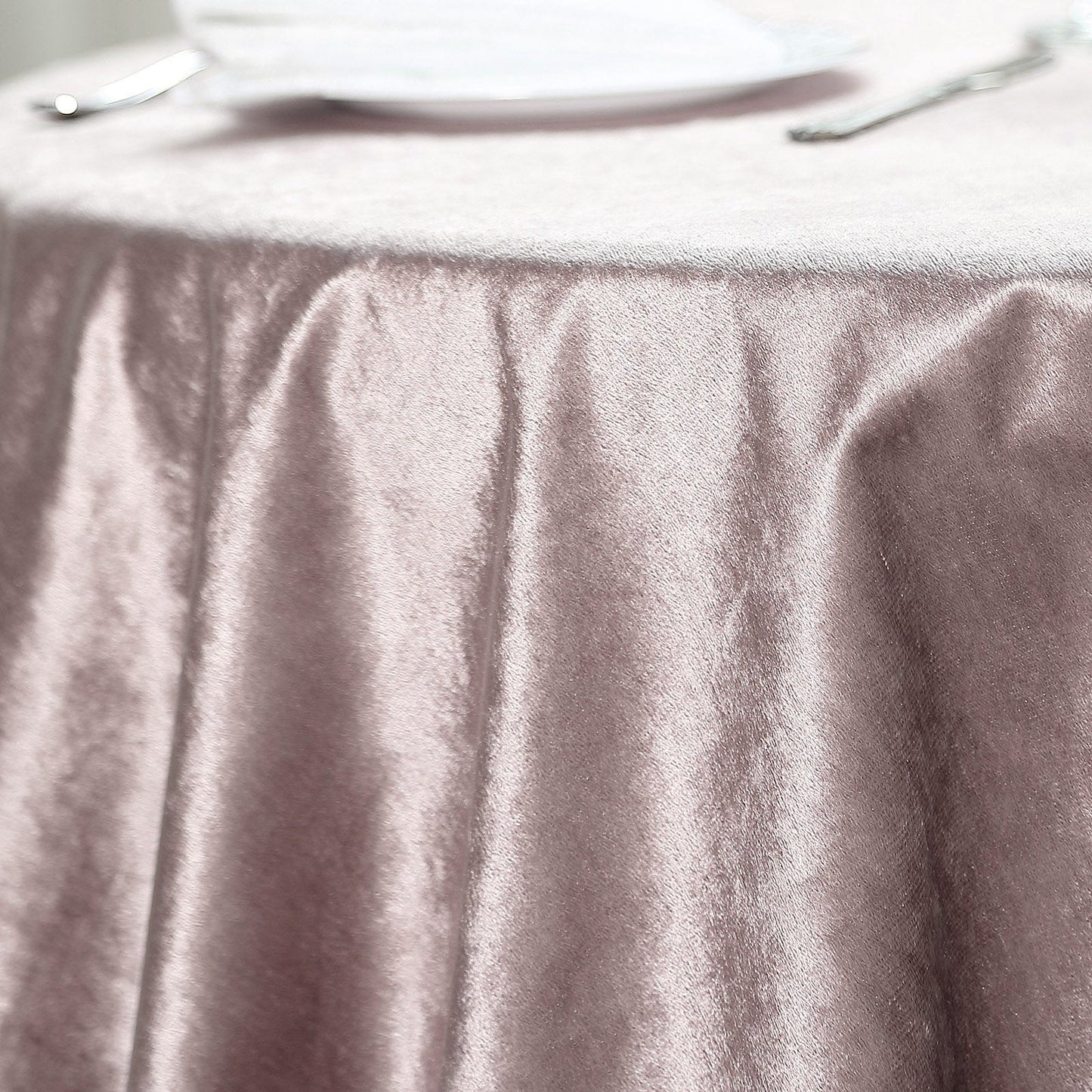 Mauve premium soft velvet table overlay on a square table.