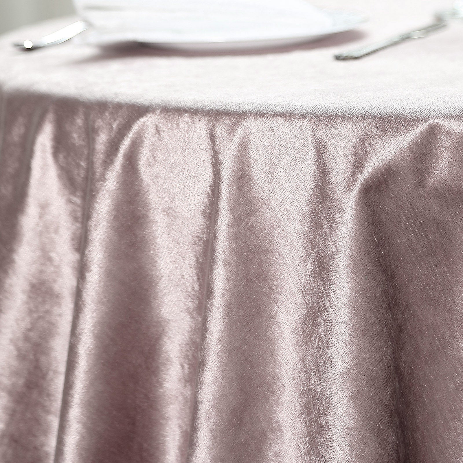 Mauve premium soft velvet table overlay on a square table.
