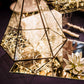 Clear starry bright LED string lights in a decorative geometric display.