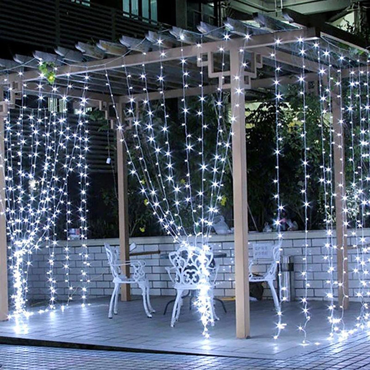 Cool white 300 LED icicle curtain lights with 8 modes for outdoor decor.