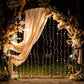 Warm white LED icicle curtain fairy lights in a decorative setting.