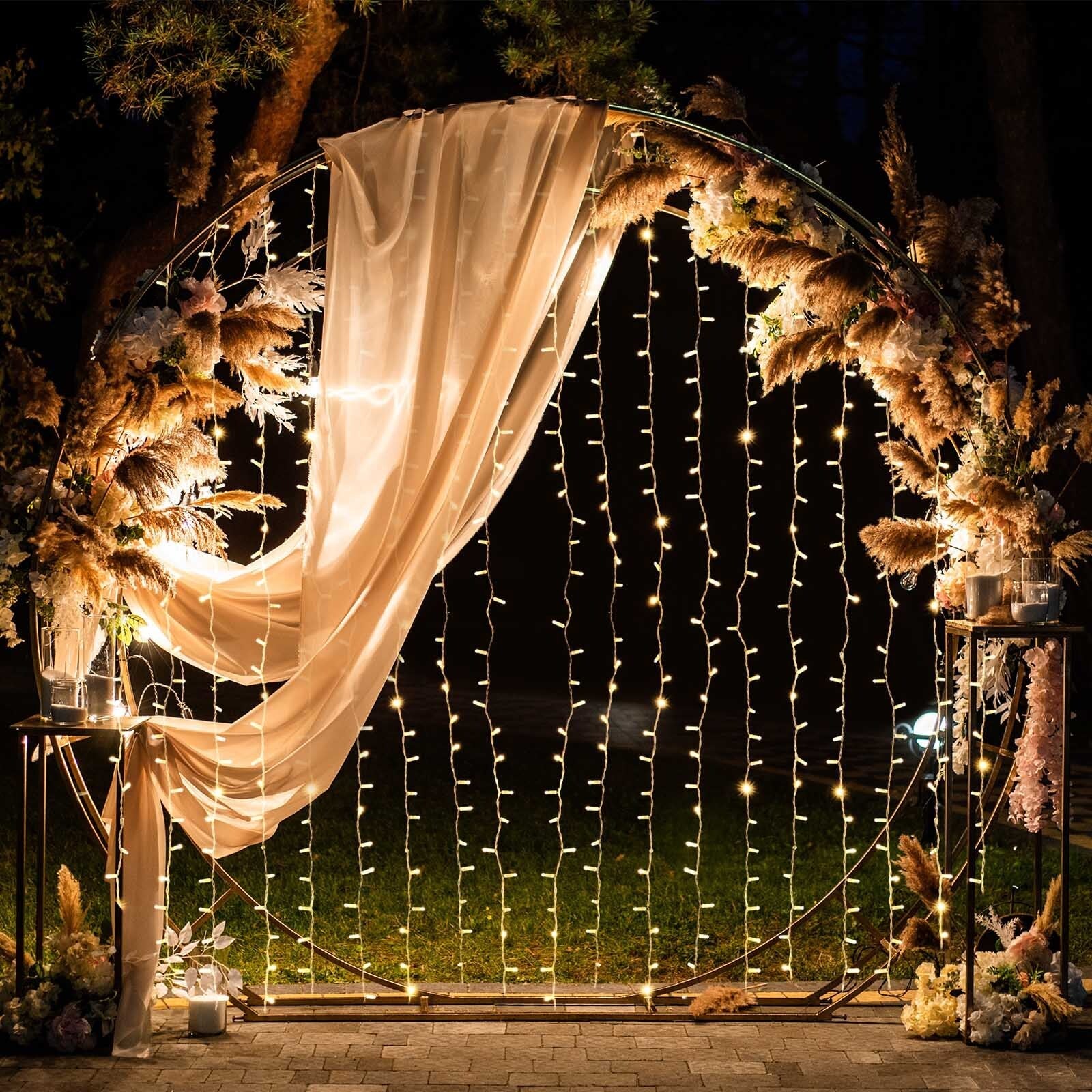 Warm white LED icicle curtain fairy lights in a decorative setting.