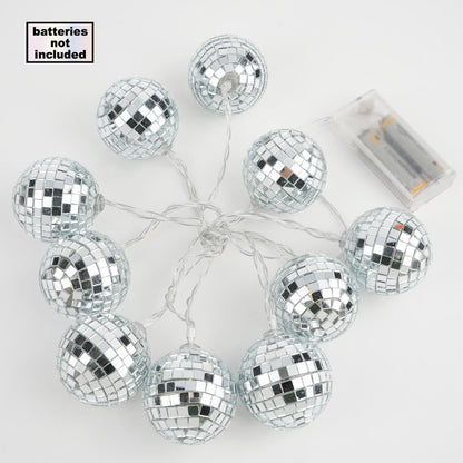 Silver disco mirror ball LED string lights on a warm white garland.