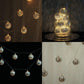 6ft silver disco mirror ball LED string lights garland, warm white glow.