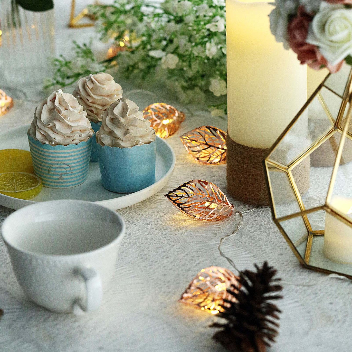 Rose gold leaves fairy string lights with warm white glow.