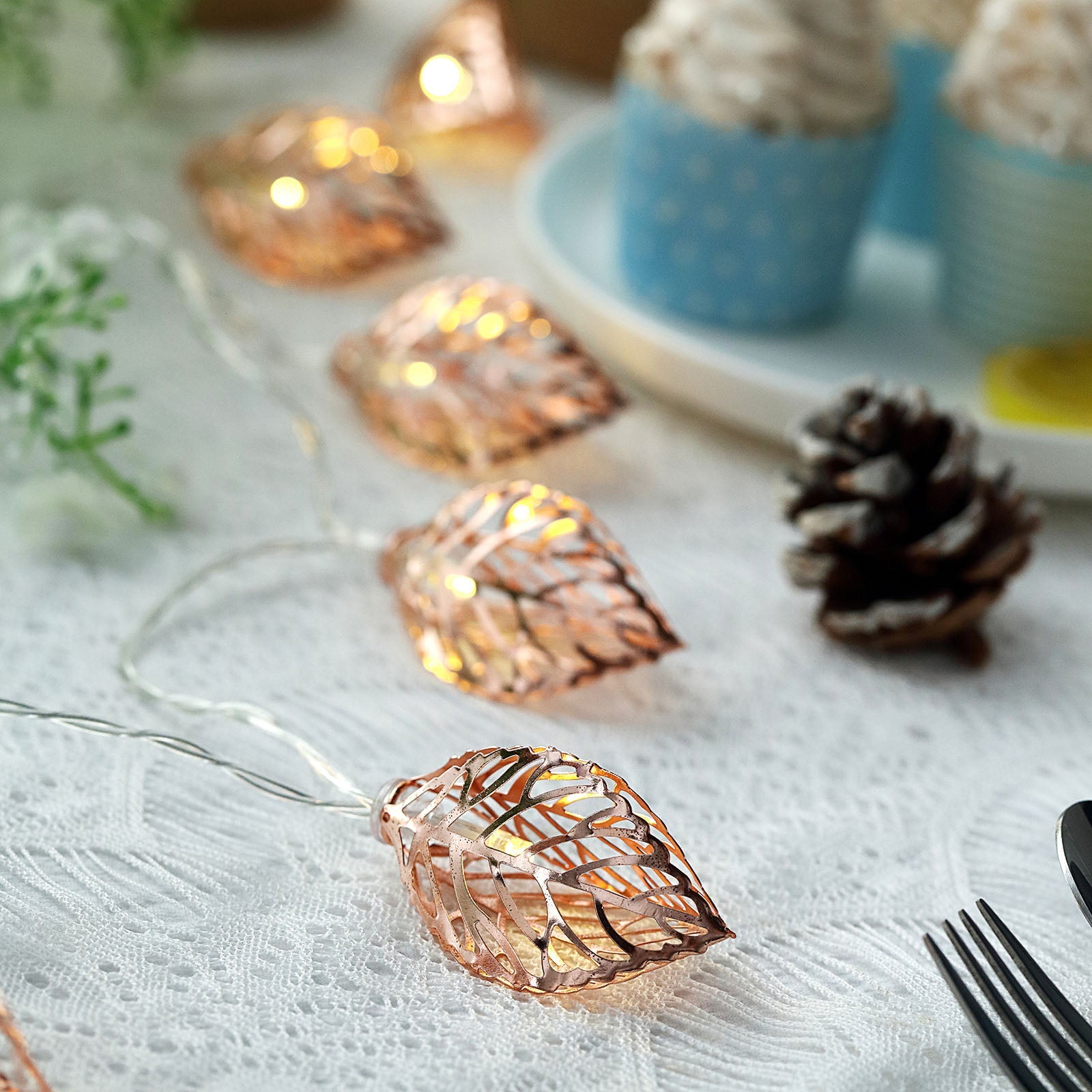 Rose gold leaves fairy string lights with warm white LEDs.