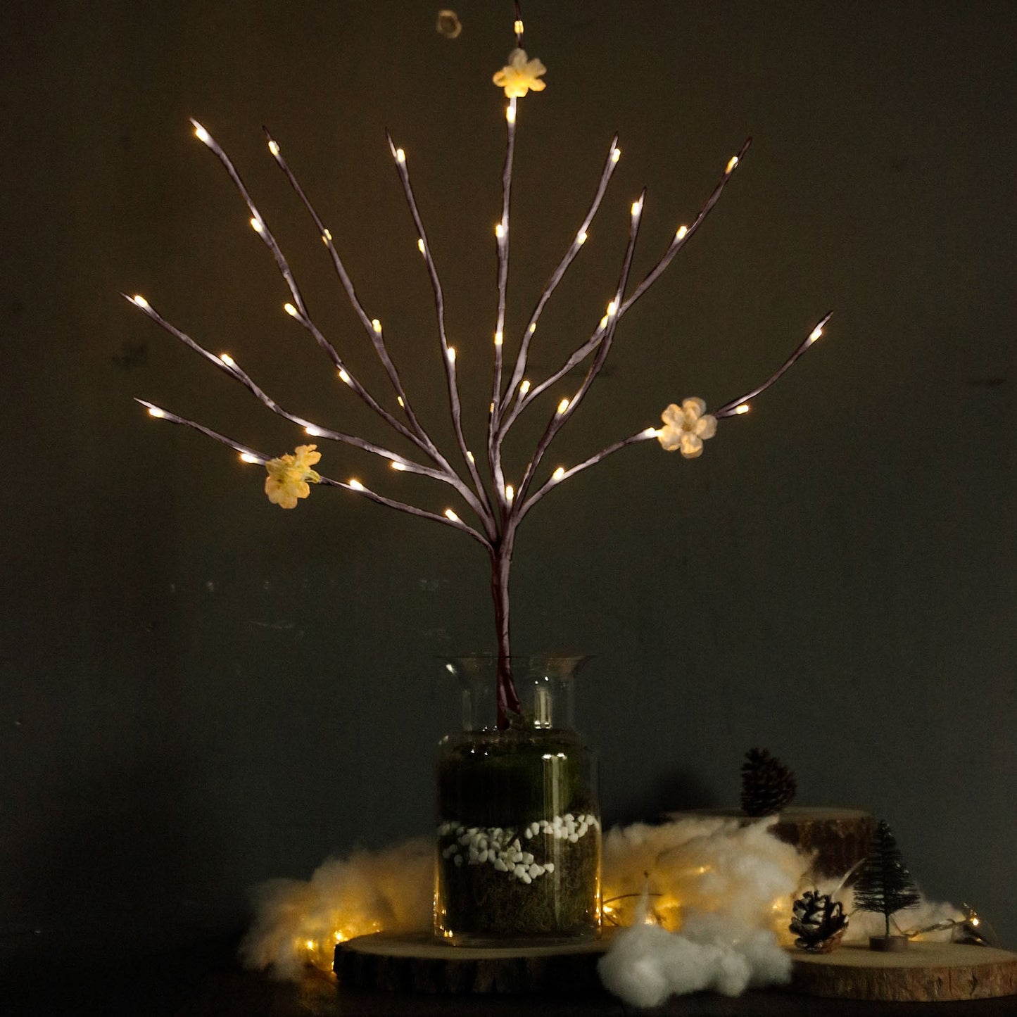 Warm white LED lighted brown tree twig branches with flowers.