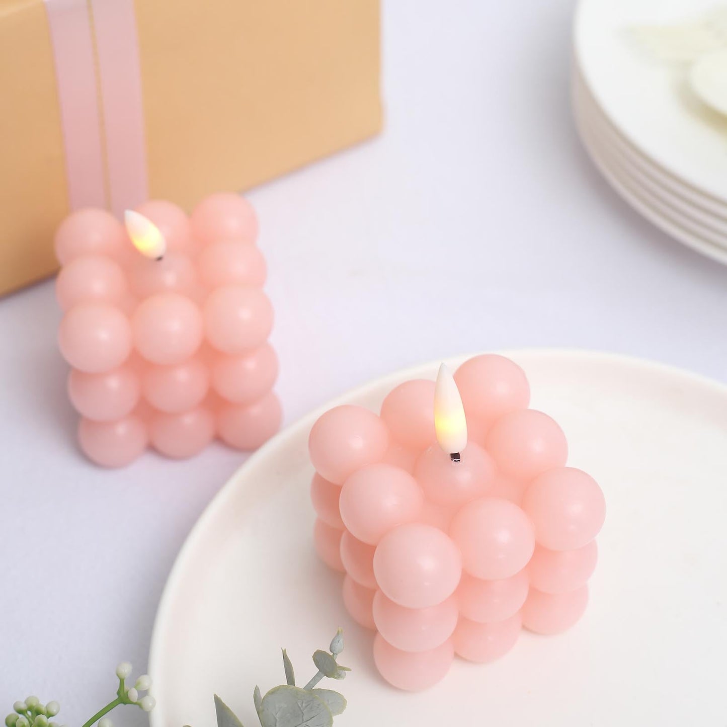 Pink LED bubble candles, flameless warm white flickering, battery-operated decor.