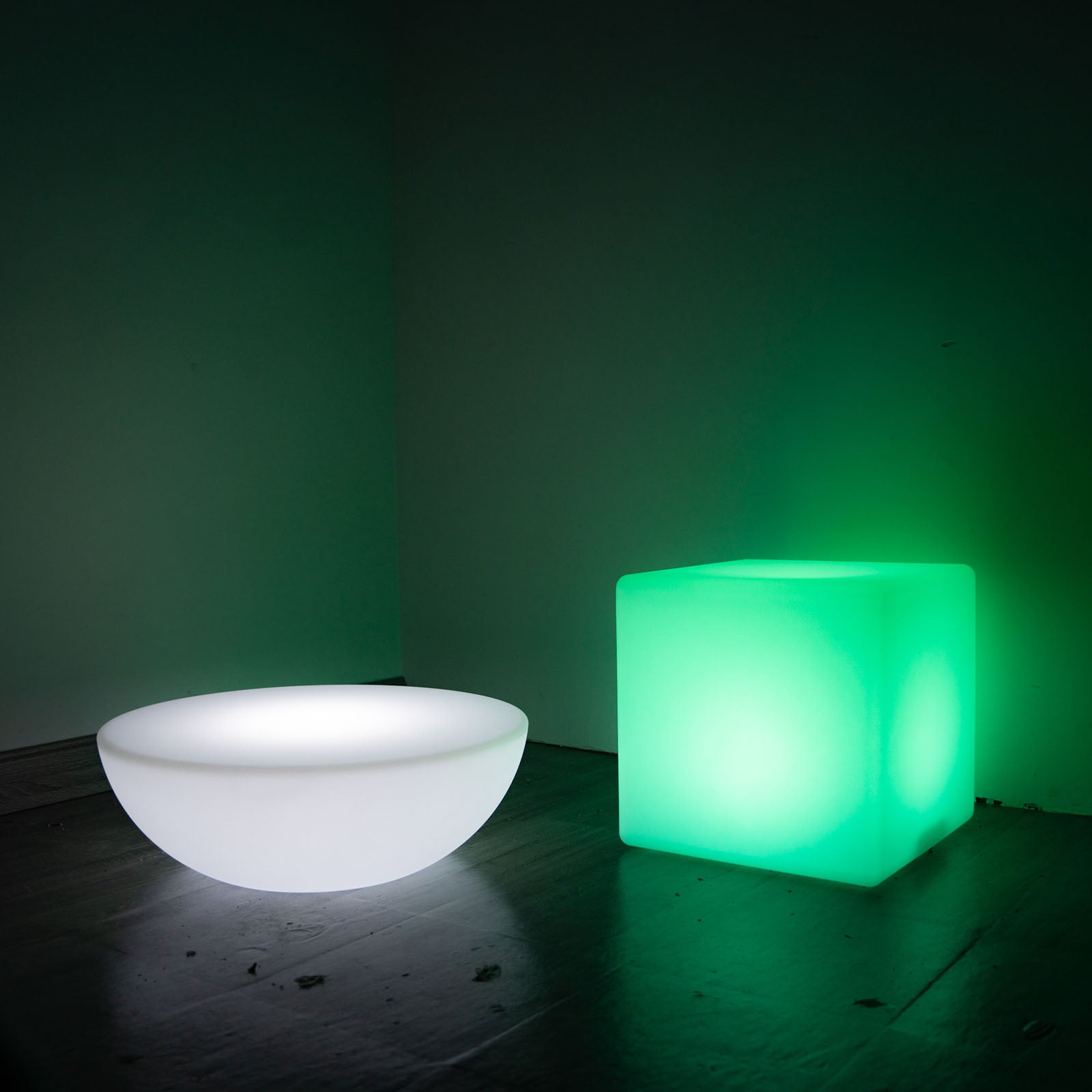 Green illuminated cube table stool, rechargeable and waterproof.