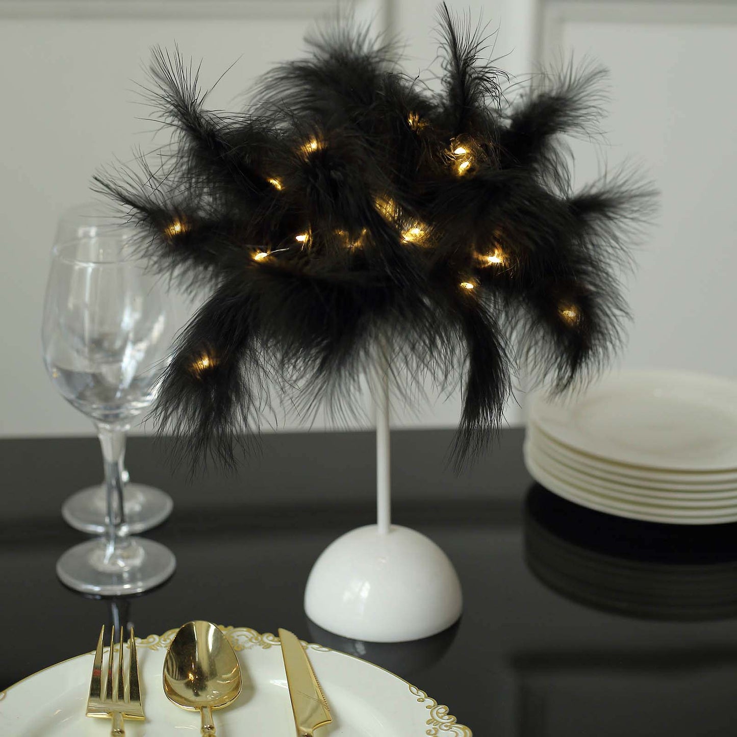 Black feather LED table lamp centerpiece for weddings.