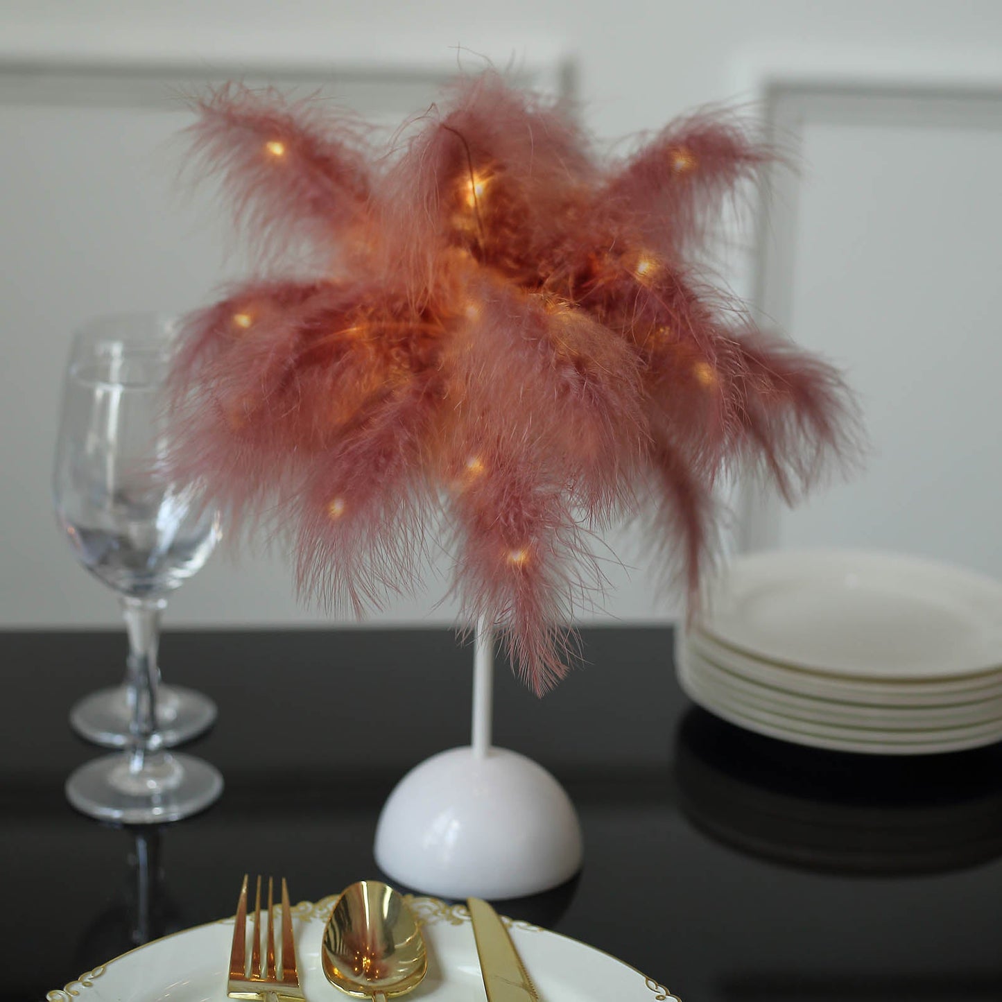 Cinnamon pink feather table lamp with LED lights for wedding centerpiece.