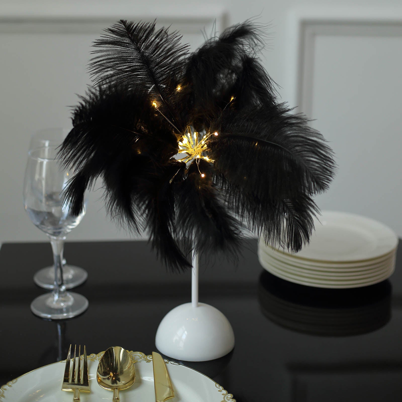 Black ostrich feather table lamp with LED lights, wedding centerpiece.