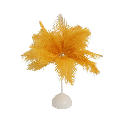 Yellow ostrich feather table lamp centerpiece for weddings, battery operated.