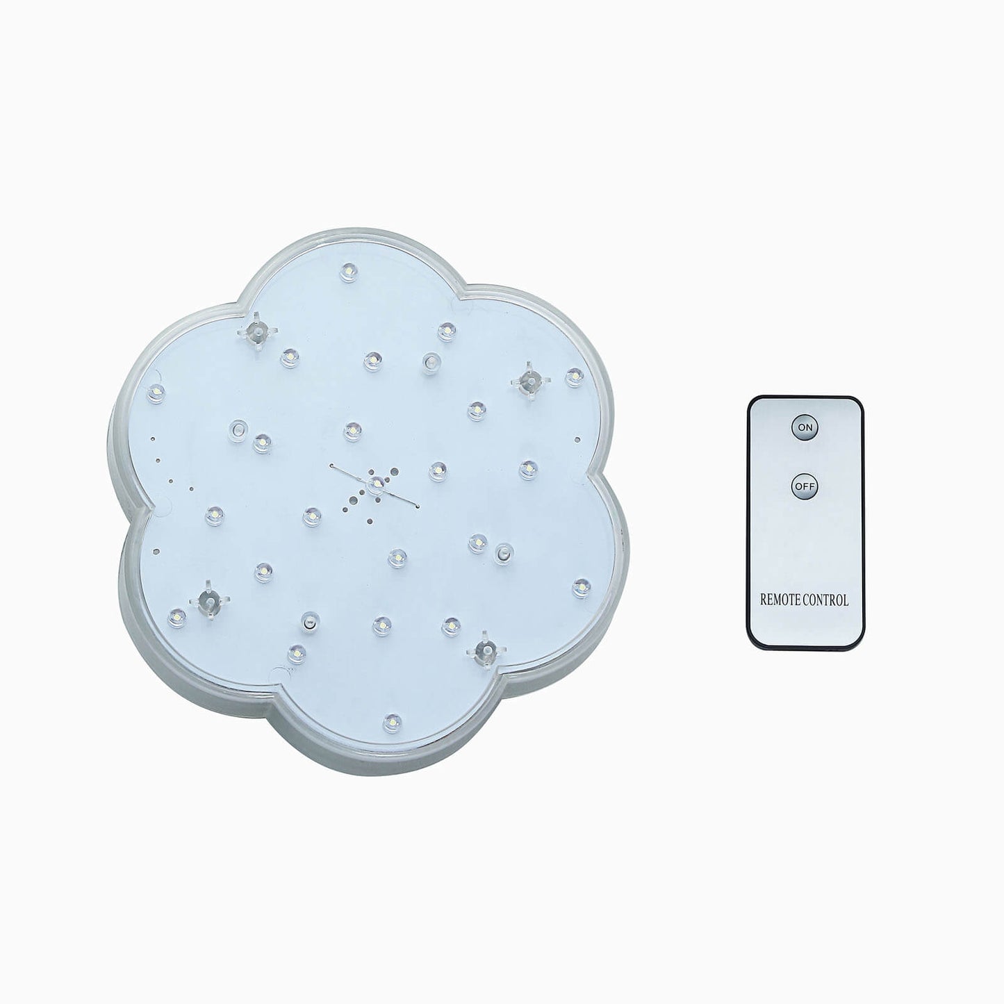 White flower-shaped LED disc light with remote control.