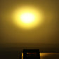 Warm white strobe light illuminating a wall, ideal for stage uplighting.