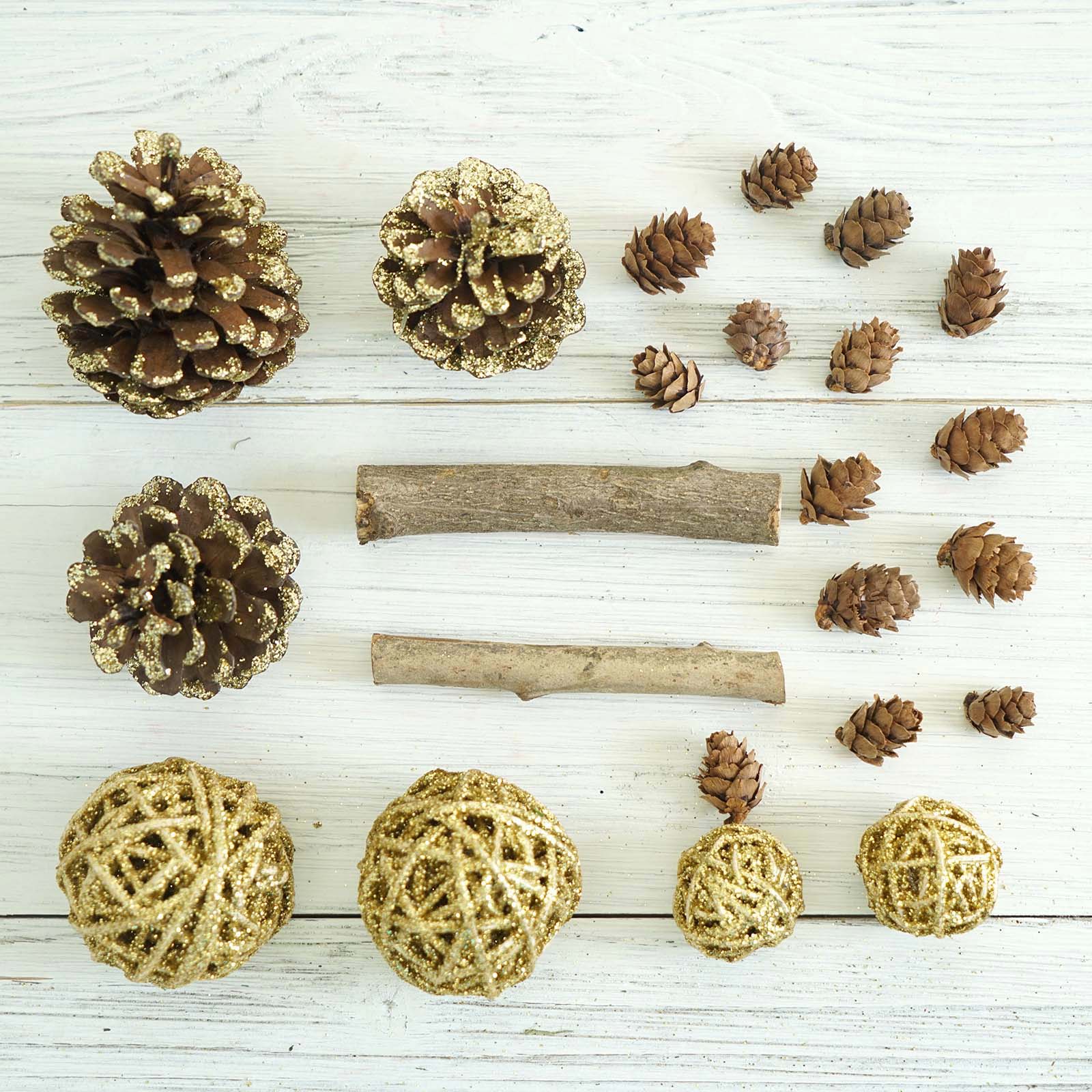 Natural dried assorted potpourri bowl fillers in gold and brown.