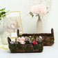 Rustic log-shaped moss planter boxes with flowers, 13" and 15" sizes.