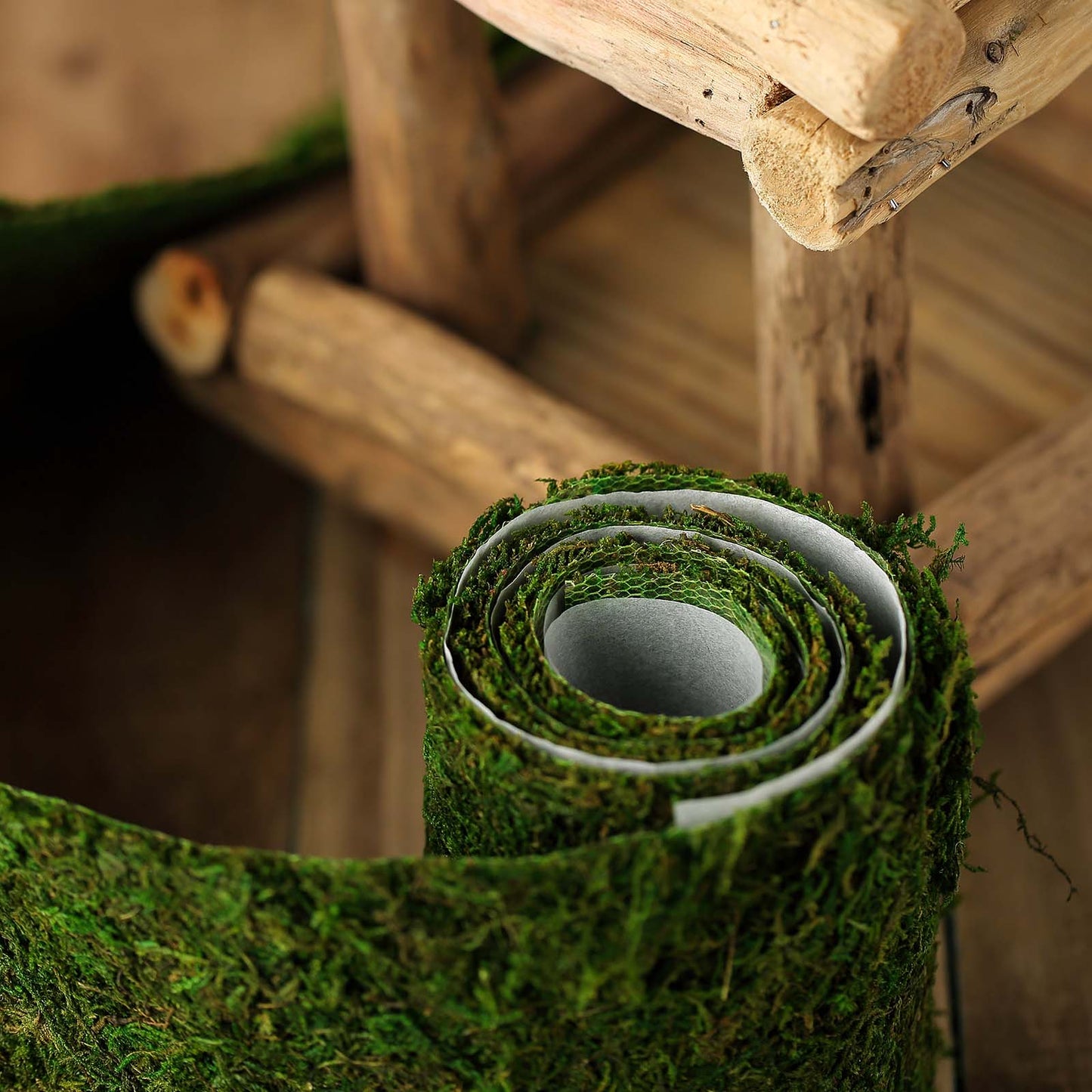 Green preserved moss ribbon roll for DIY crafts.