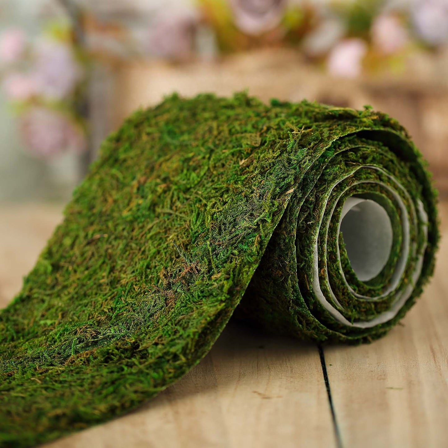 Green preserved moss ribbon roll for DIY crafts.