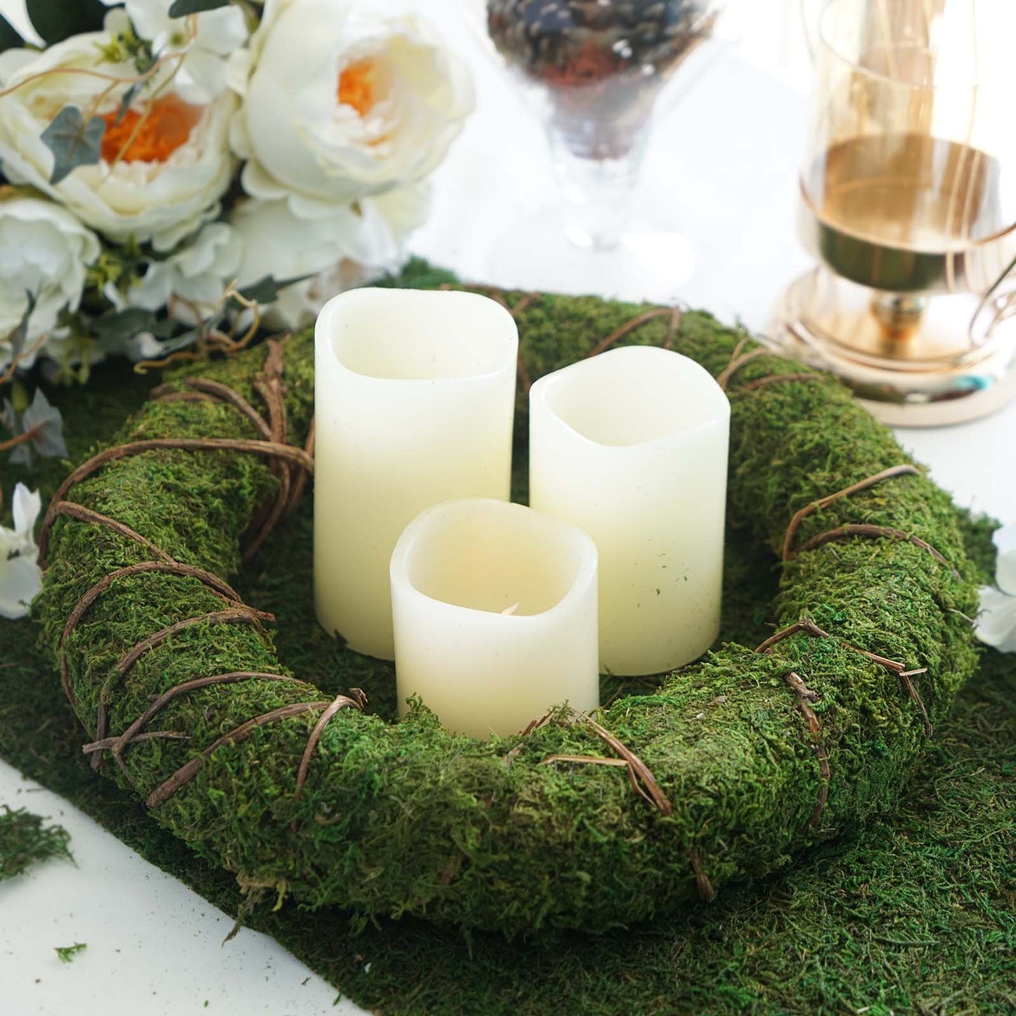 14" green preserved moss wreath with twine wrap and candles.