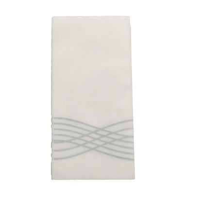White linen-feel paper napkin with silver waves print.