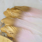 Metallic gold tip dual tone blush white craft feathers for party decoration.