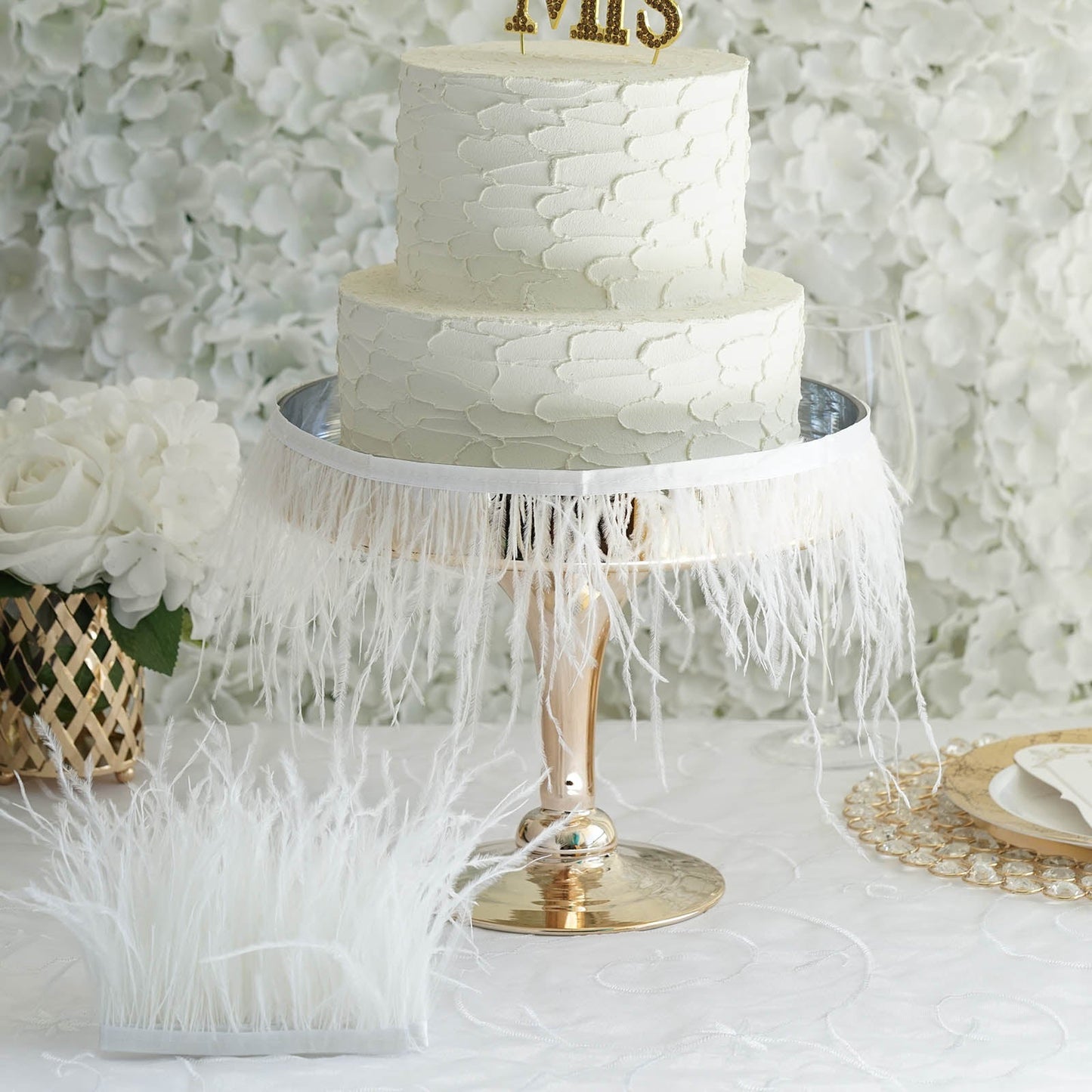 White ostrich feather fringe trim with satin ribbon tape.