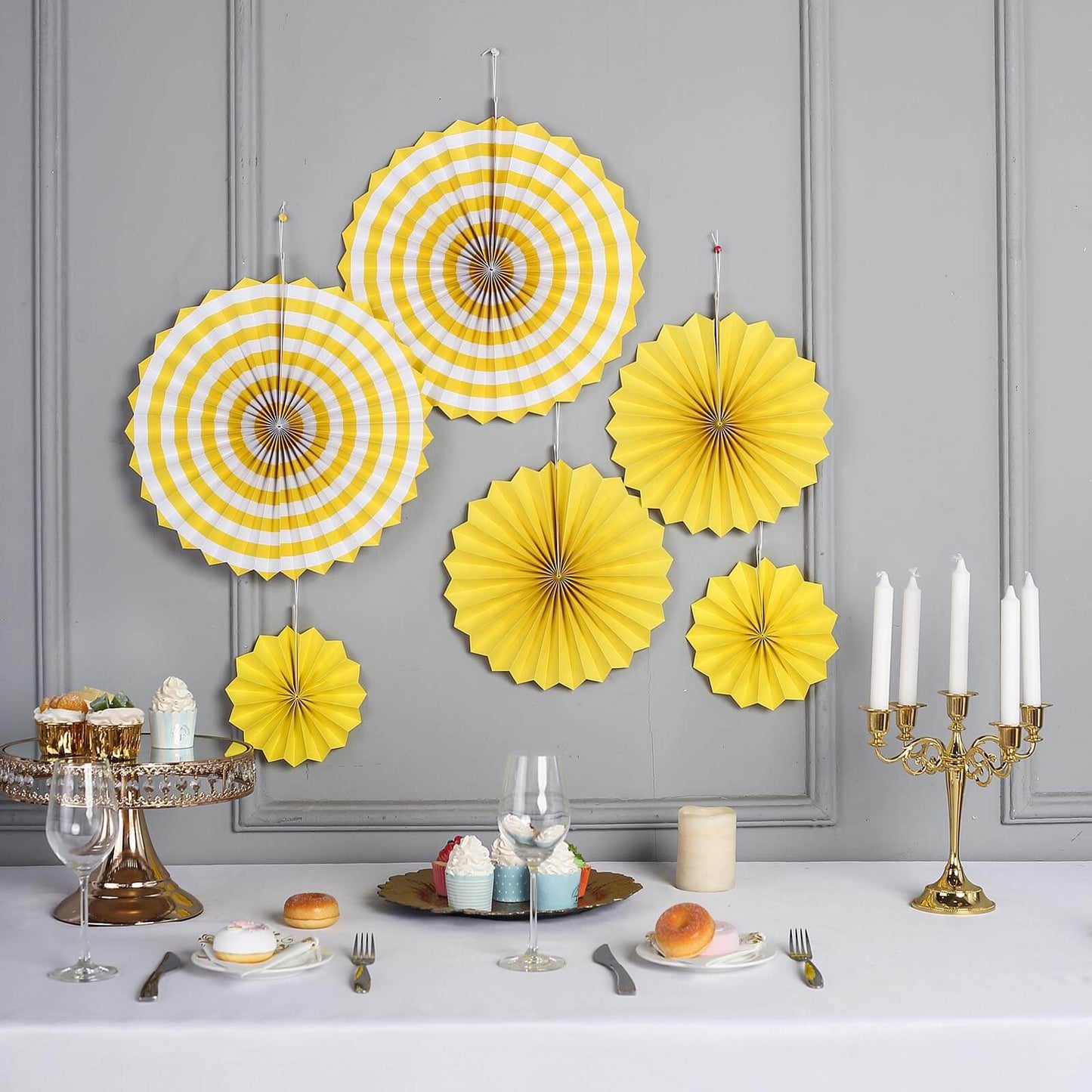 Yellow hanging paper fan decorations for party backdrop, set of 6.