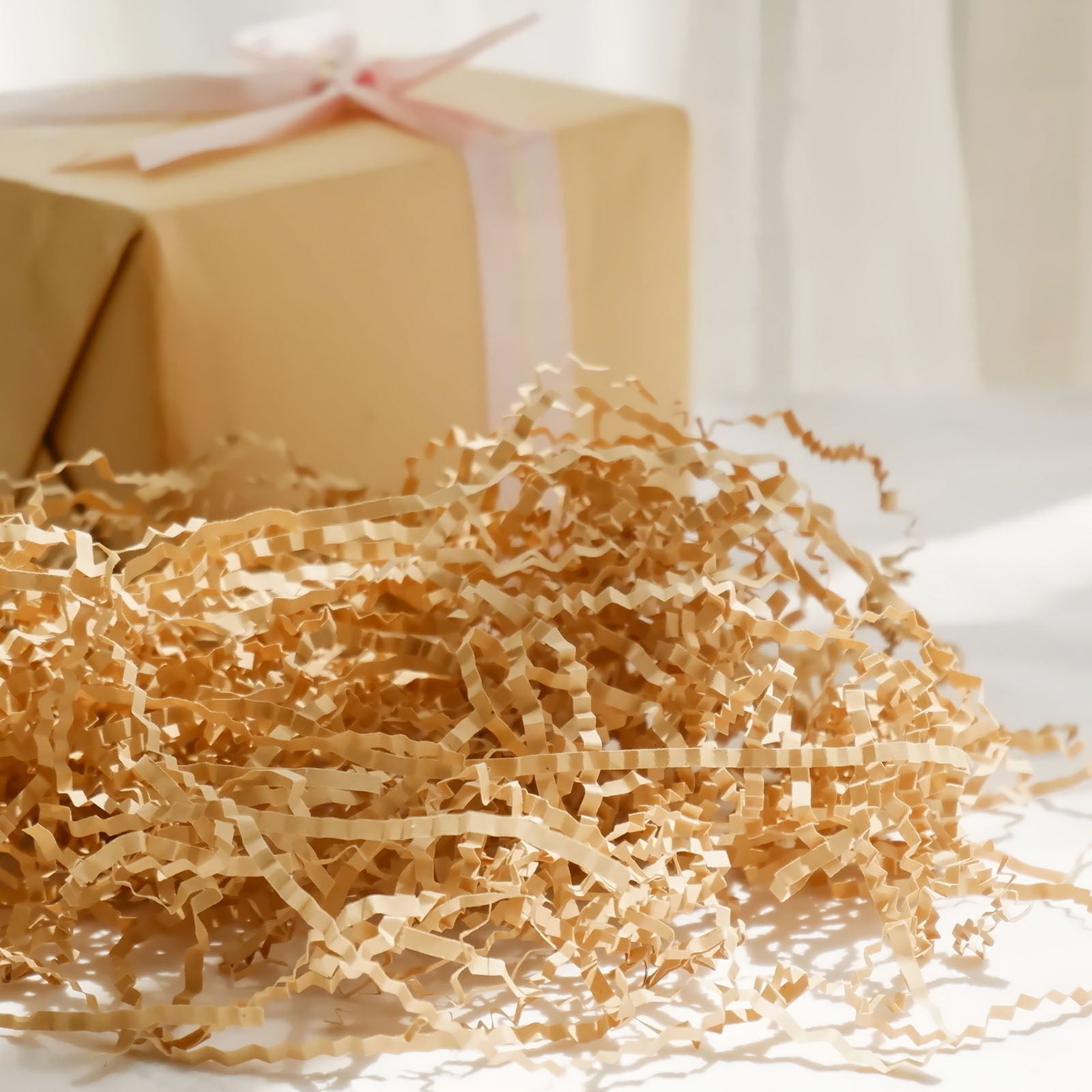 Natural brown paper shred basket filler for gift bags.