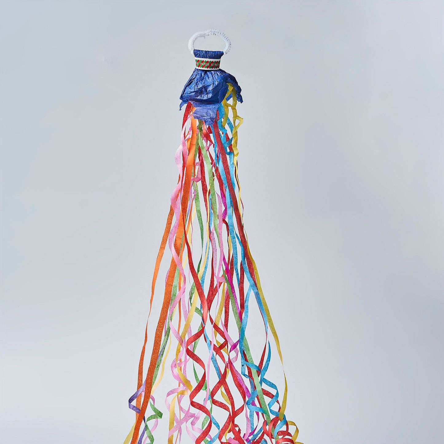 Assorted color handheld surprise paper streamers for festive celebrations.