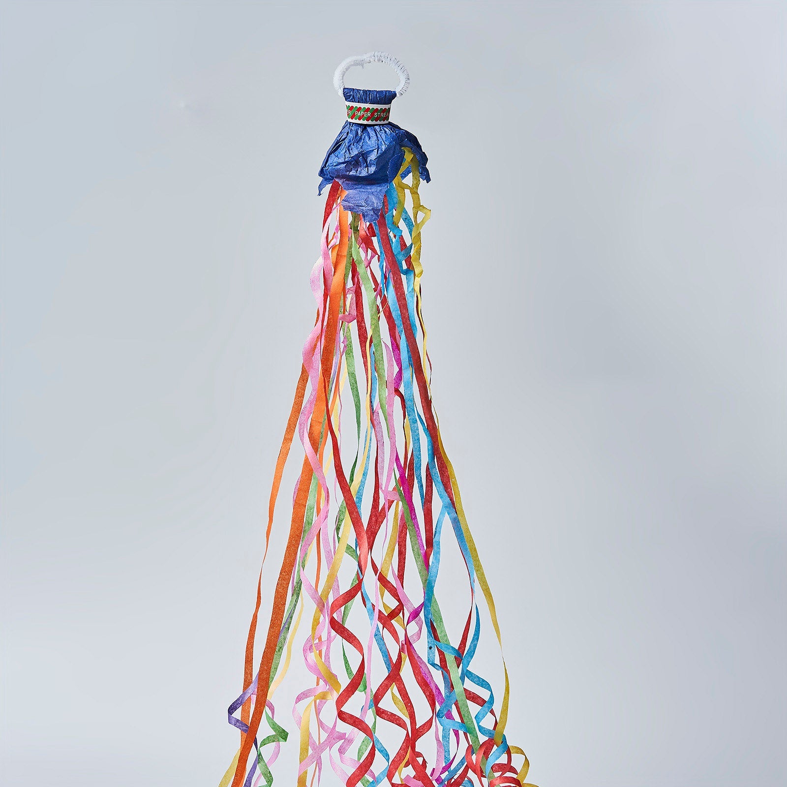 Assorted color handheld surprise paper streamers for festive celebrations.