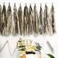 Antique gold fringe tassels banner for festive celebrations.