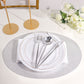 Silver sparkle vinyl placemats on a dining table setting.