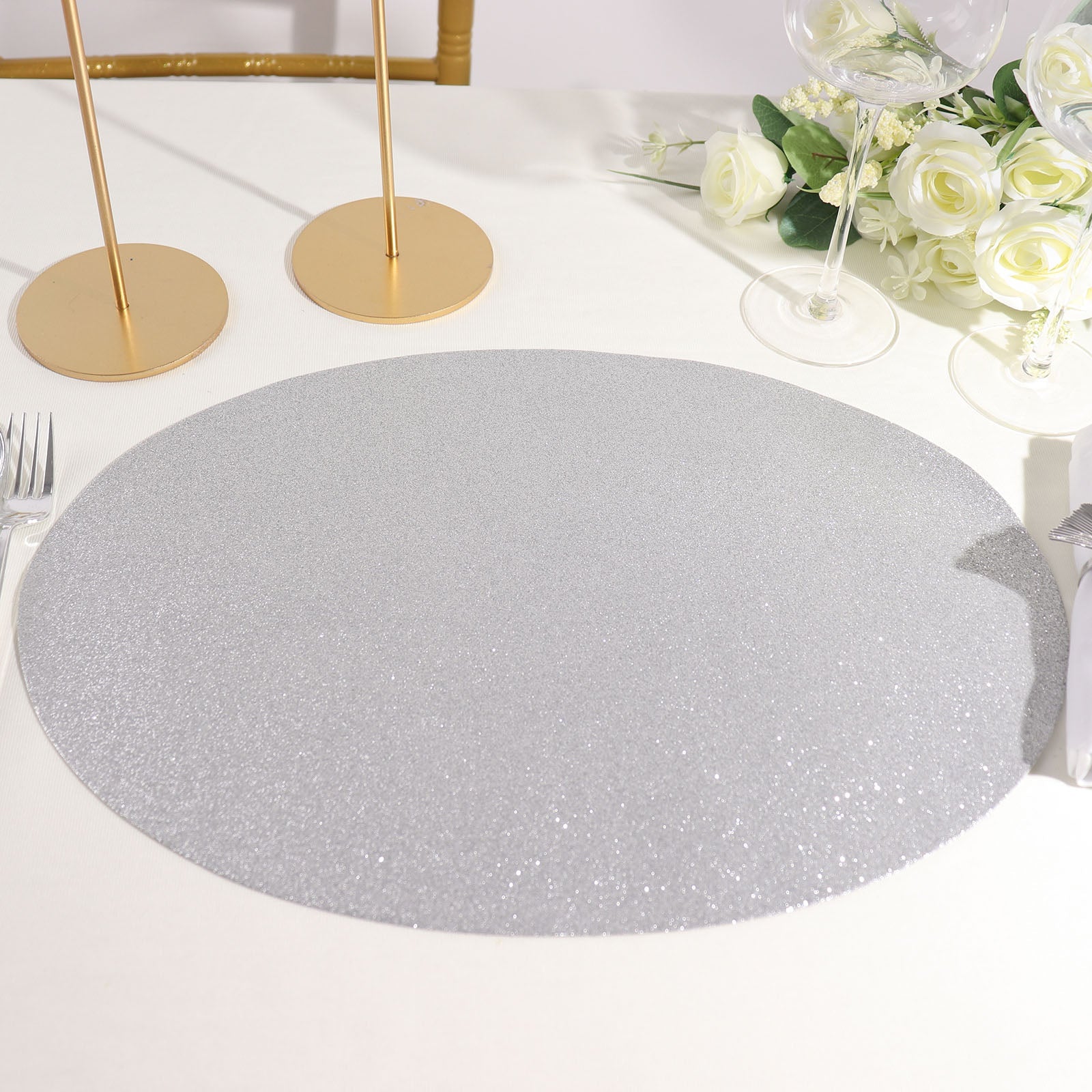 Silver sparkle vinyl placemat on a table setting.