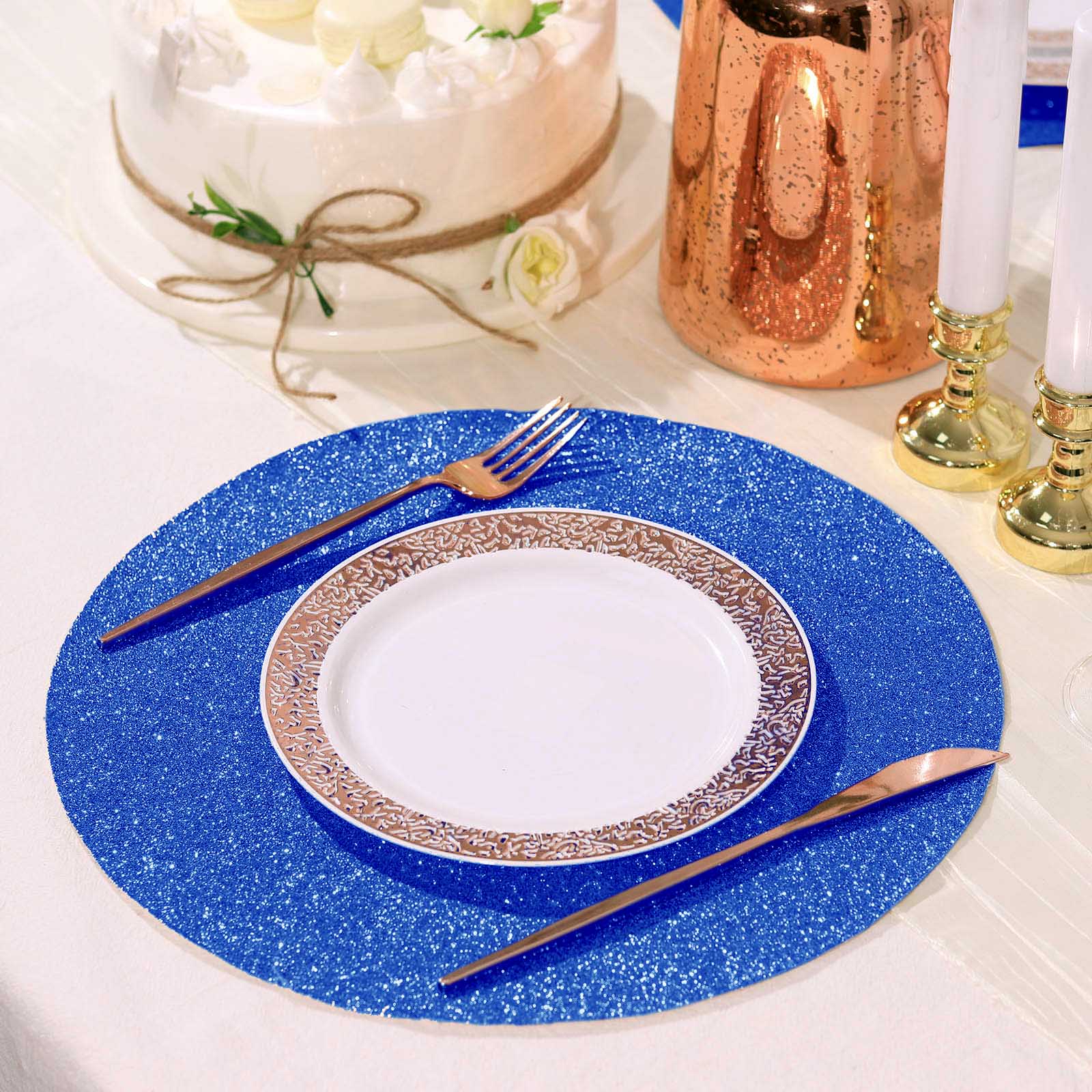 Royal blue sparkle vinyl placemats on a table setting.