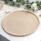 Natural burlap jute placemat with braided edges, perfect for farmhouse decor.