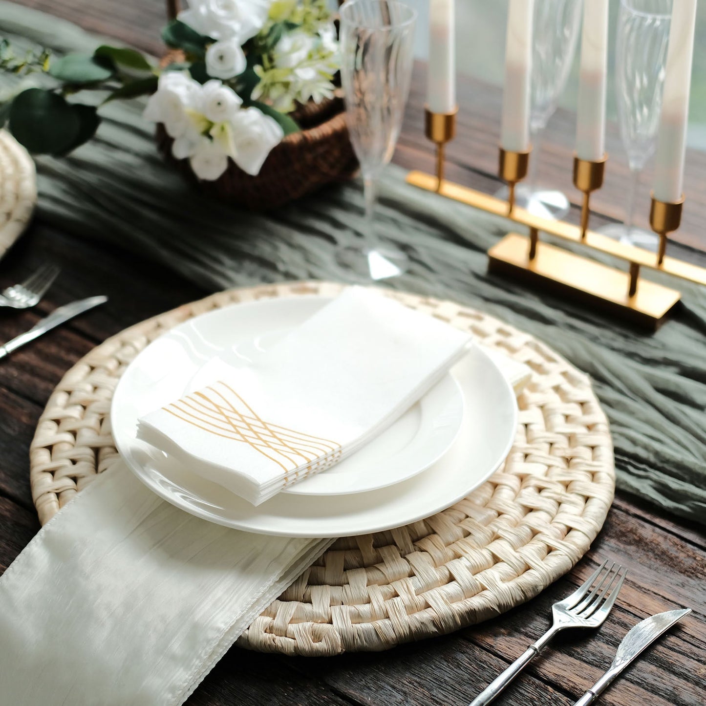 Natural corn husk round woven placemats on a rustic table setting.