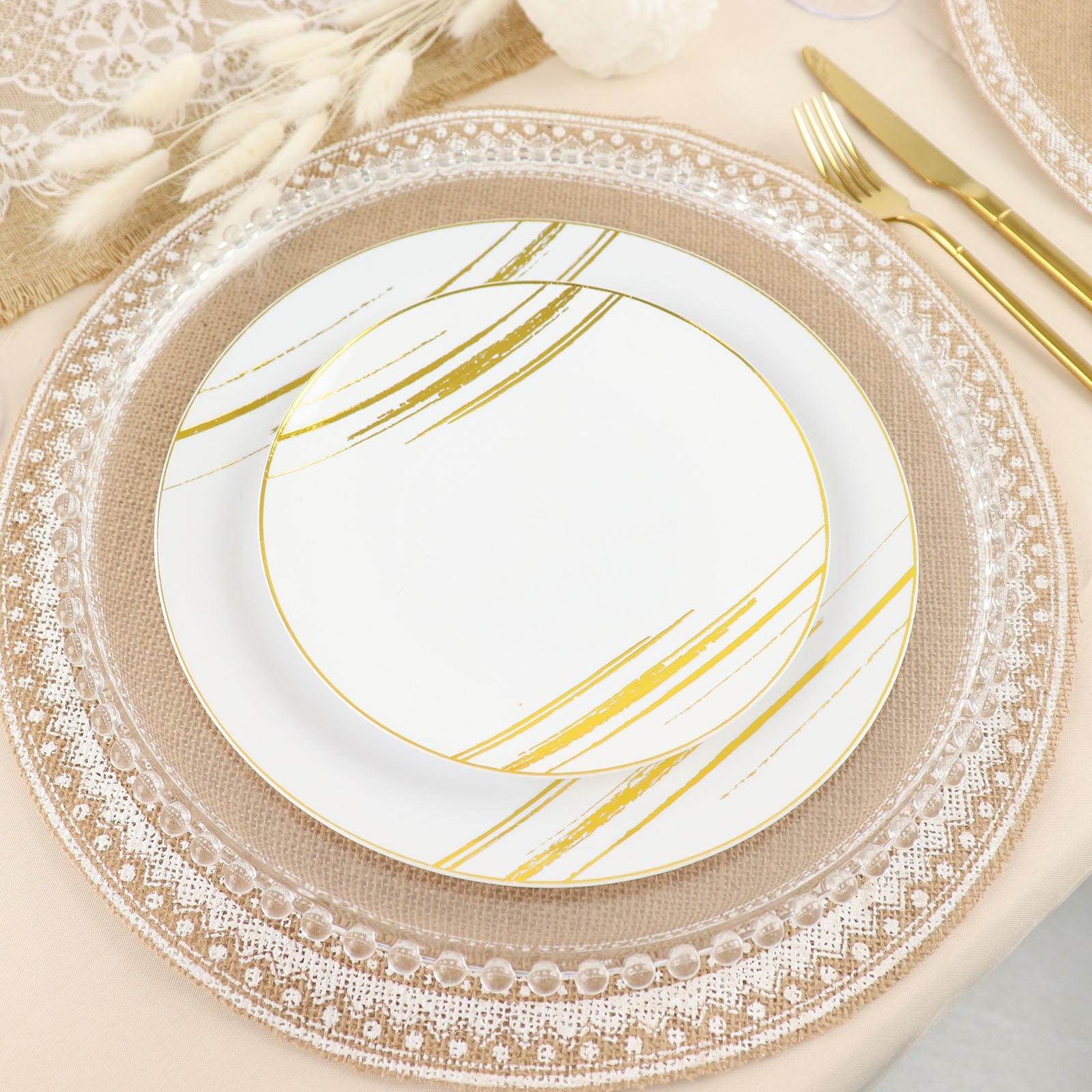Natural jute and white braided placemats on a rustic table setting.
