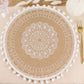 Natural jute and white embroidery mandala print round placemat with tassels.