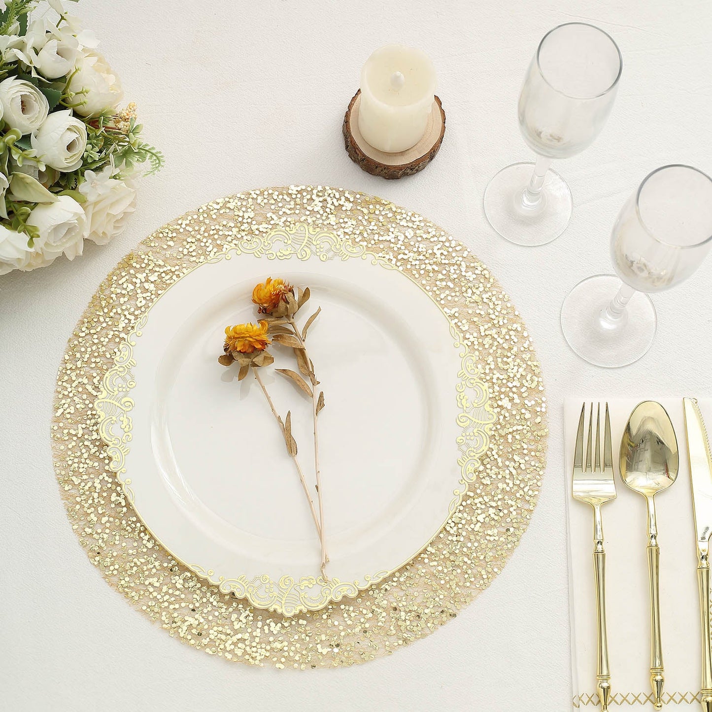 Metallic gold round sequin placemat with floral arrangement and dining setup.