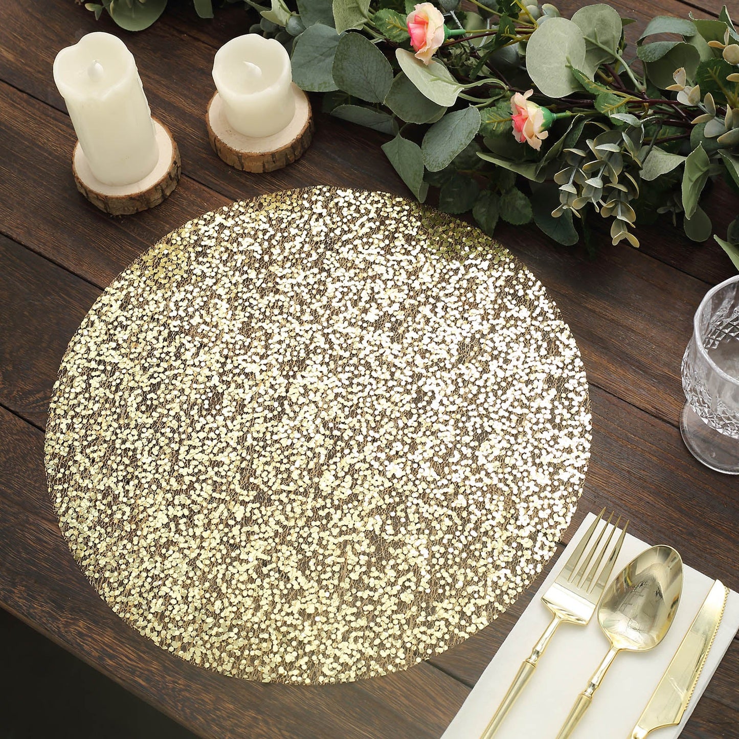 Metallic gold round sequin placemat on a dining table setting.
